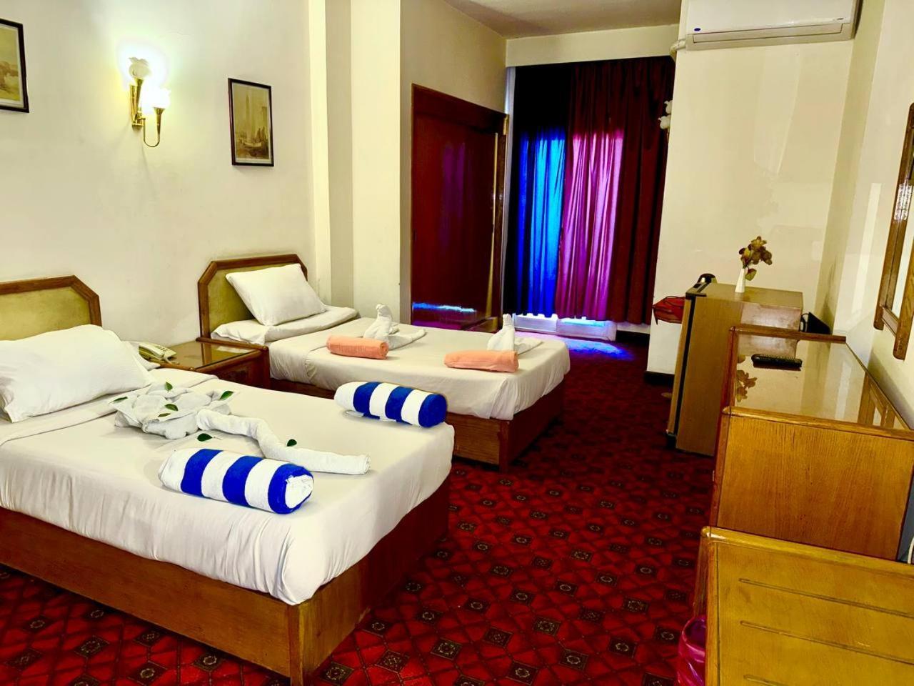 Queens Valley Hotel Luxor Esterno foto
